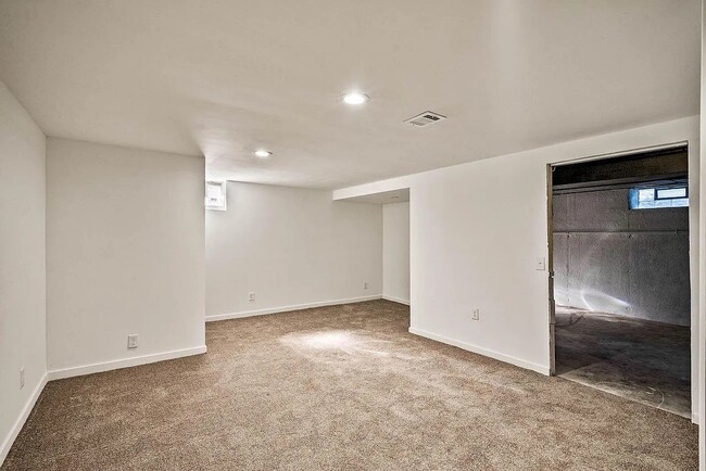 Finished Basement - You can spot unfinished area where washer & dryer are located - 3550 Monarch Dr