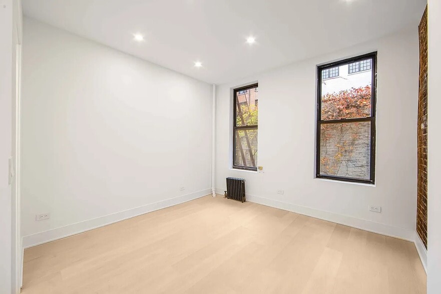 Building Photo - 51 W 8th St