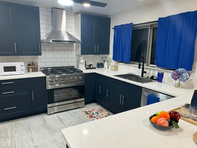 Building Photo - Gorgeous Remodeled 4 Bedroom Home