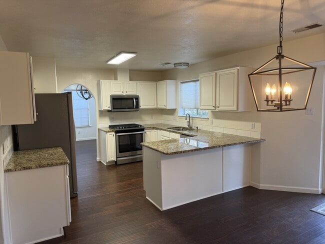 Building Photo - 10538 Olympic St NW