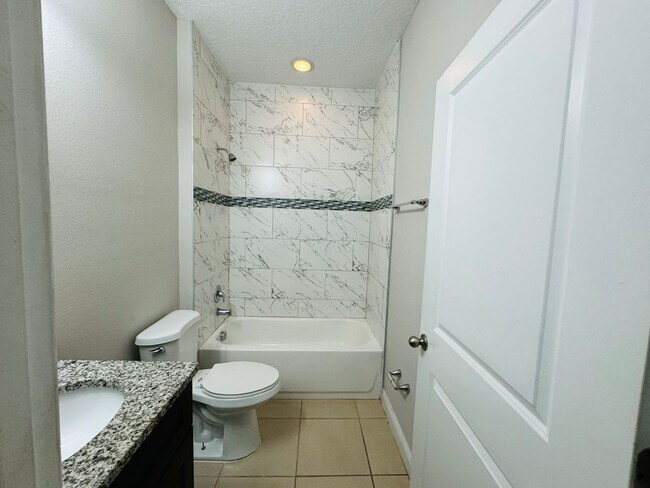 Building Photo - Spacious 4BR/2BA Home with Modern Upgrades – Rent Ready!!!