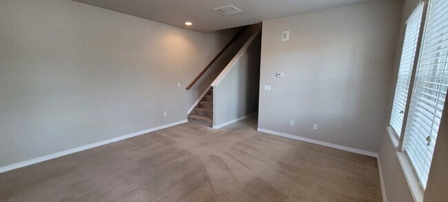 Building Photo - "Charming 3-Bedroom Townhouse Retreat in Colorado Springs – Spacious 1704 Sq Ft with 2.5 Bathrooms!"