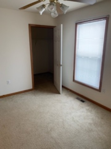 Master bedroom with walk in closet - 1106 Heather Dr