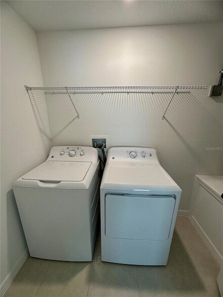 Building Photo - 8795 Coqui Song Ln