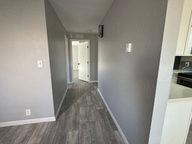 Building Photo - Upstairs 2 bedroom condo with washer and d...