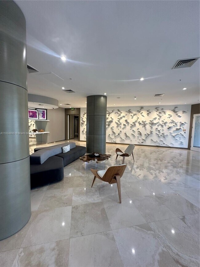 Building Photo - 10275 Collins Ave
