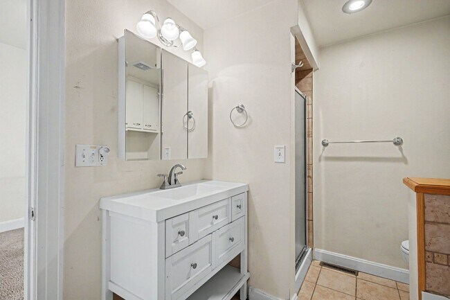 Building Photo - Beautifully Preserved Englewood Home with Fenced Backyard