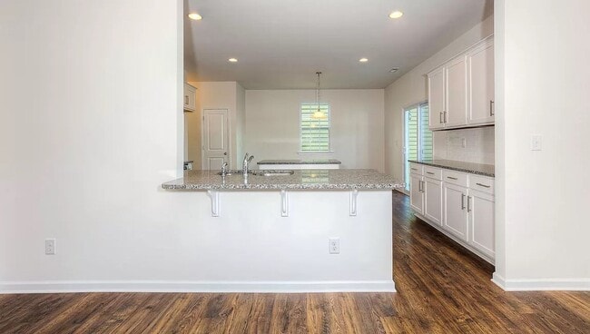 Building Photo - Special! $500 off the first two months' rent with a lease signed in July.
