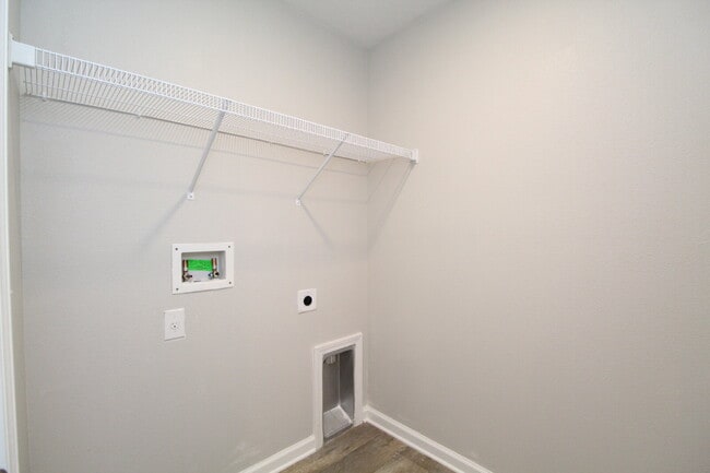 Building Photo - Coming Available Soon – 4BR/2BA Brick Home with Open Floor Plan, Solar Panels & 2-Car Garage in L...