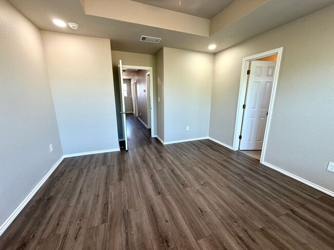 Building Photo - Modern 3BR Townhome w/ Garage, Private Yard & No Carpet – Built 2022