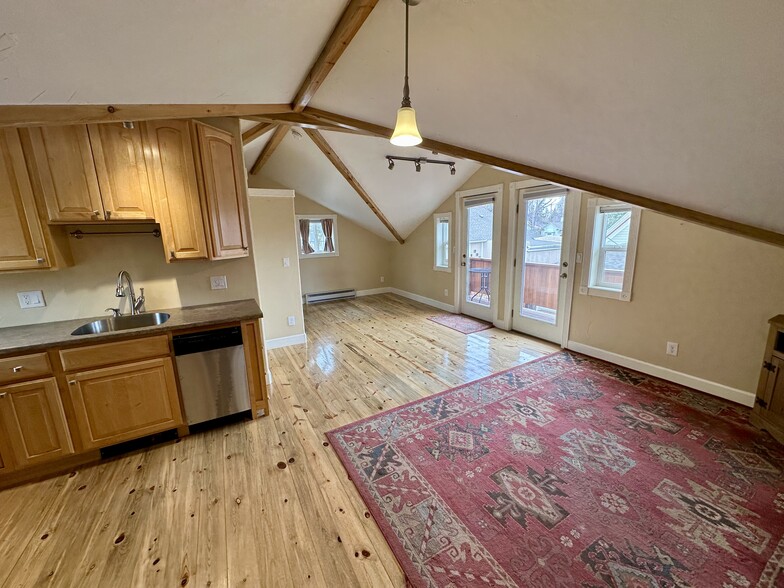 Gorgeous main living space with open kitchen. - 812 E Cache La Poudre St