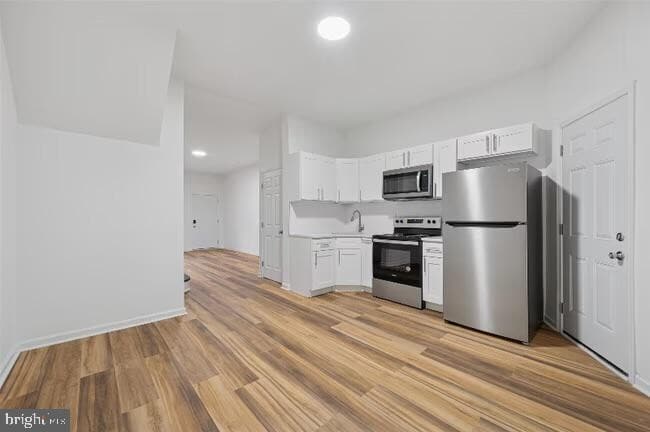 Building Photo - 5628 W Girard Ave
