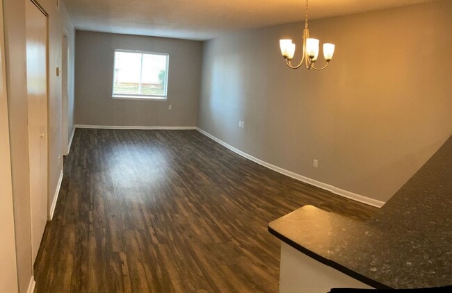 Building Photo - Just off the main road, but in walking dis...