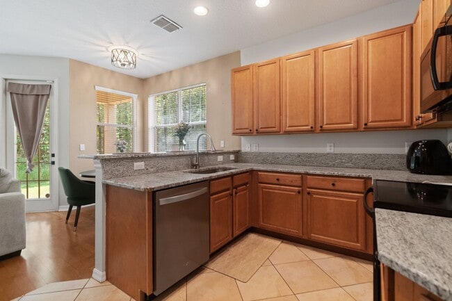 Building Photo - West Meadows 3 Bedroom Townhome Awaits!