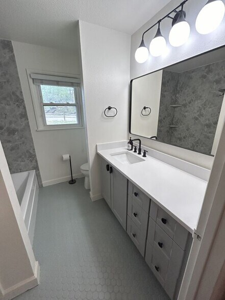 Building Photo - 1003 W Bluebonnet Dr