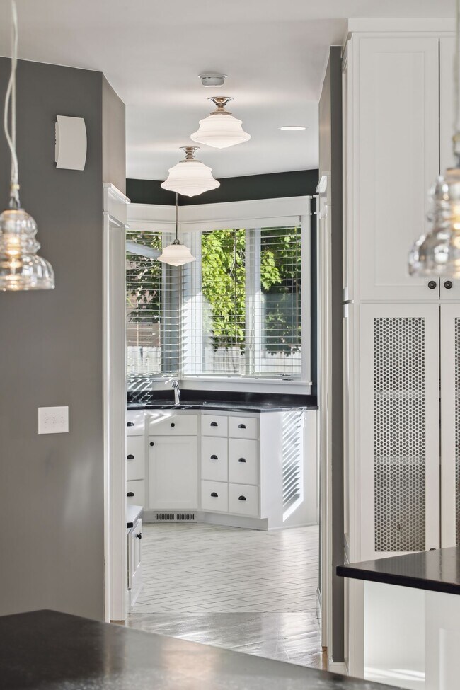 Cast Iron Laundry sink with Soapstone Counters with USB Charging Center in Cubbies / Drawers. - 924 Eleanor Ave
