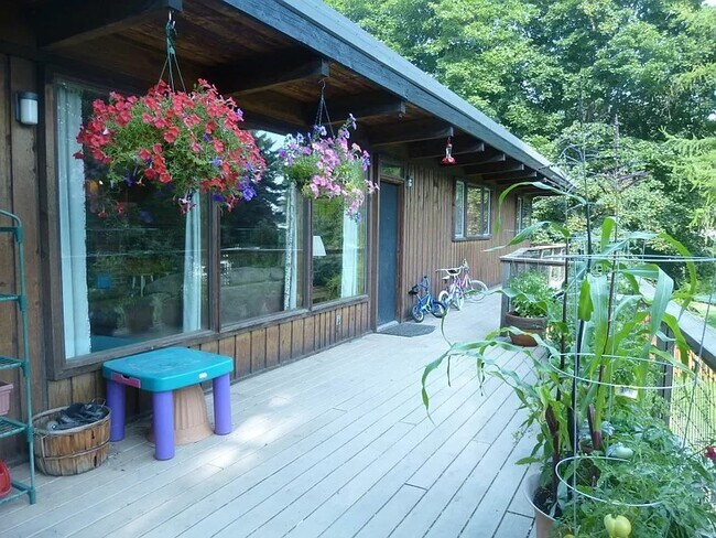 A look at the deck outside the living room. - 1705 NE Lower Dr