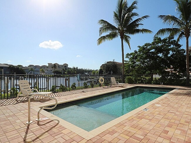Building Photo - BEAUTIFUL 3-BEDROOM  WATERFRONT CONDO WITH BOAT SLIP AND HEATED POOL