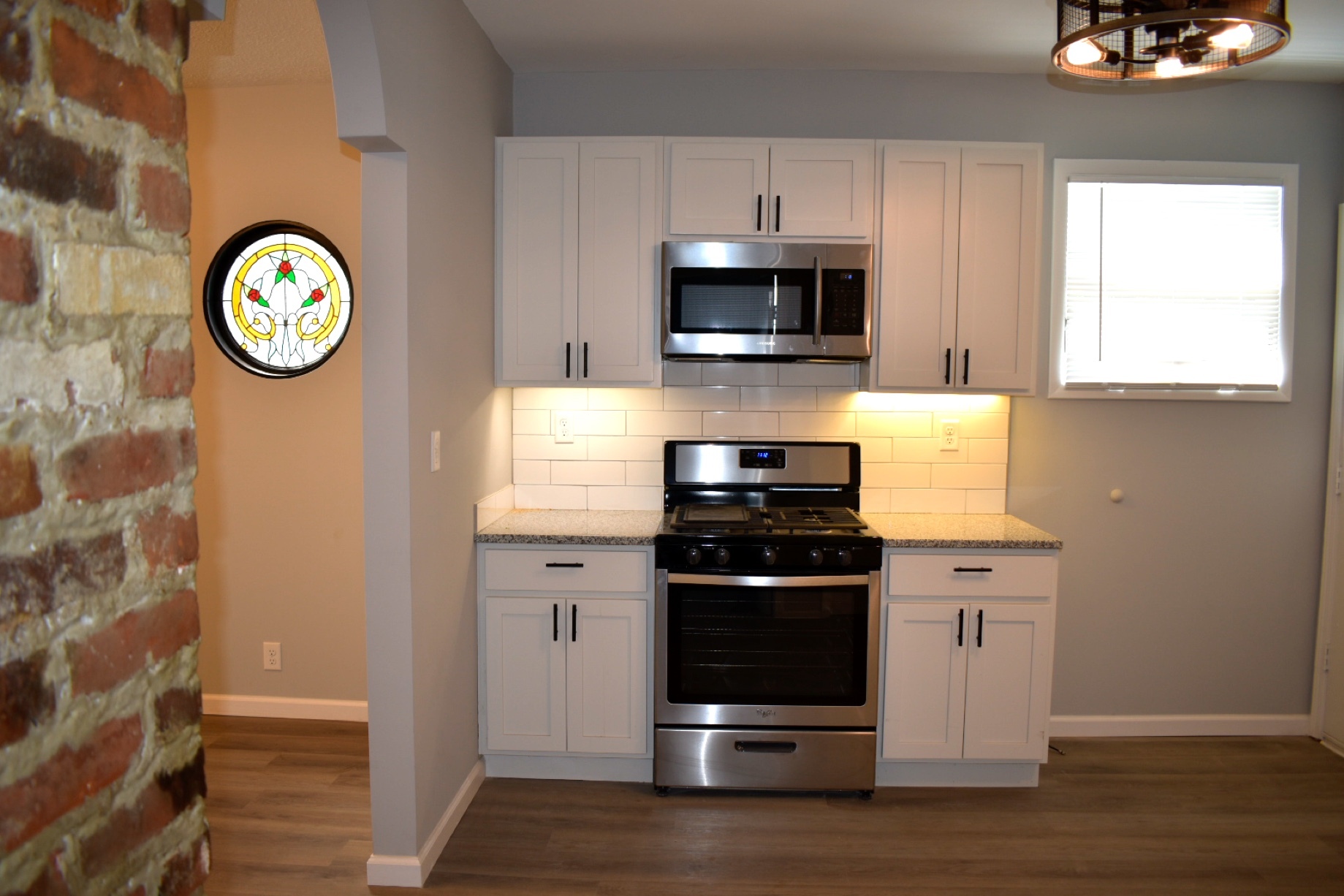 Kitchen with gas stove - brand new appliances - 2416 West 10th Street
