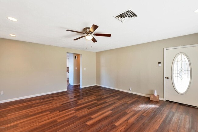 Building Photo - Remodeled property with lots of space and ...