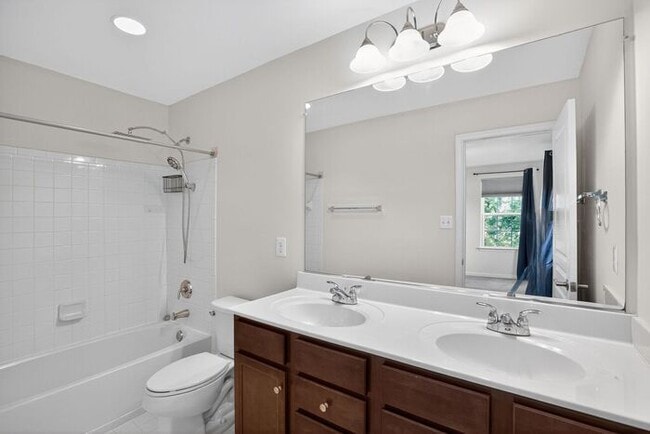 Building Photo - Pet Friendly 3 level End Unit Town Home wi...
