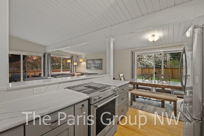 Building Photo - Fantastic Modernized Bridle Trails Mid Century Home * Central A/C, EV Charger, Exceptional Outdoo...