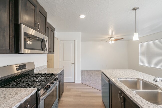 Building Photo - Modern 4-Bed Stand-Alone Home with Fenced Patio