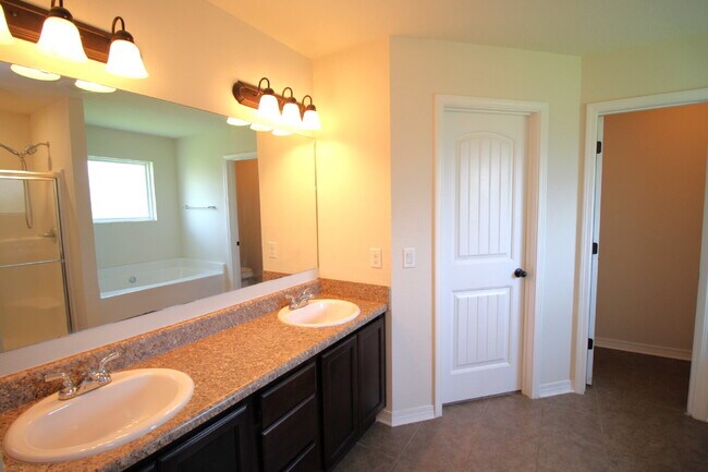 Building Photo - Coming March 16th — Upgraded 3-Bed, 2-Bath Pace Home in The Woodlands with Open Floor Plan, Bonus...