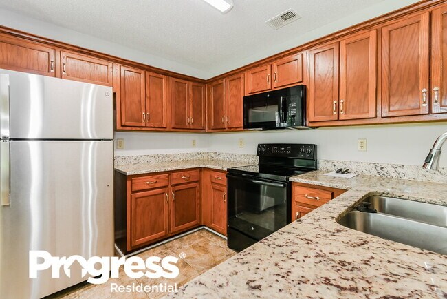 Building Photo - 4258 Ravenwood Dr N