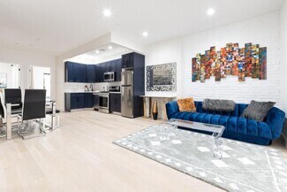 Building Photo - Stunning New 4 Bed Duplex w Massive Privat...