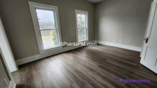 Building Photo - 9804 Miles Ave