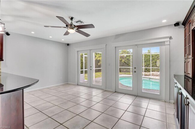 Building Photo - 42nd Terrace Southwest, Naples, FL 34116 -...