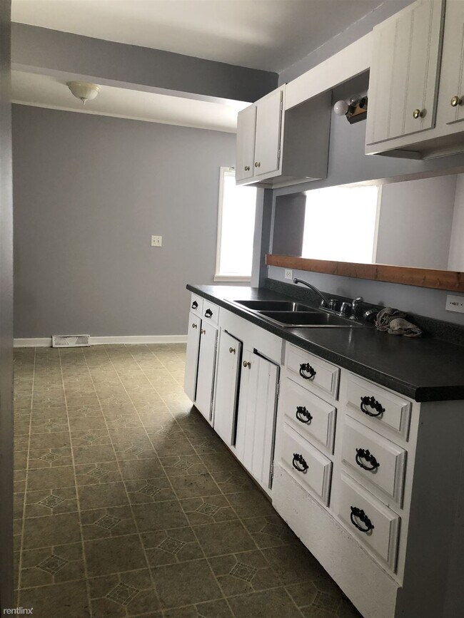 Building Photo - 4 br, 1 bath House - 1303 Throop St