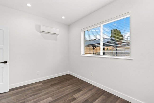 Building Photo - Brand new 2 bed/2 bath, central a/c, dishwasher, washer & dryer, deck & patio! March rent free!