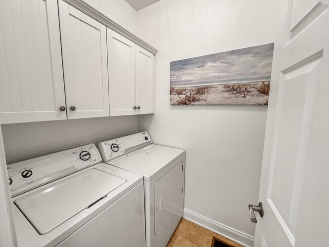 Building Photo - Fully Furnished Waterfront Elegance on Mai...