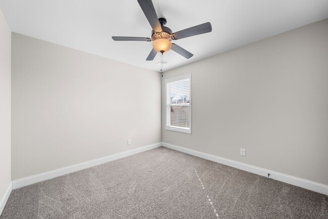 Building Photo - Pet Friendly Three Bedroom with Bonus!