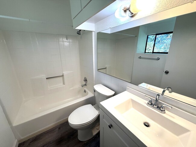 Building Photo - UPPER END UNIT TWO BED / TWO BATH CONDO IN...