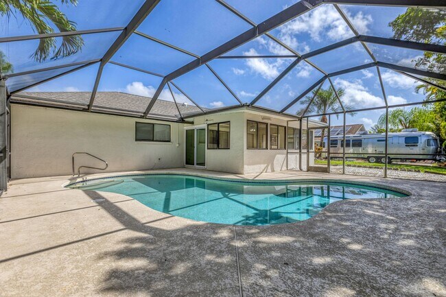 Building Photo - ** WILLOUGHBY ACRES ** POOL HOME - 3 BED / 2 BATH - PETS OK! - NORTH NAPLES - ANNUAL RENTAL