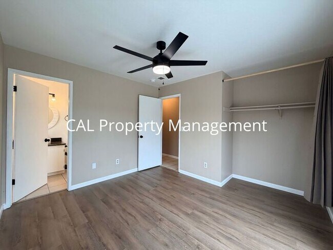 Building Photo - Spacious 4-Bedroom Home with 2-Car Garage & Backyard Oasis
