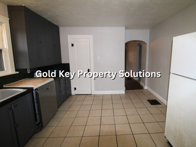 Building Photo - Large 2 BR 1 BA House with Family Room, Basement, Garage, and Separate Storage Building (SECTION ...