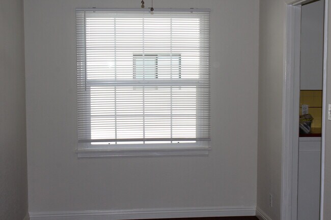 Dining Room Looks out onto alley - 4435 E Ocean Blvd