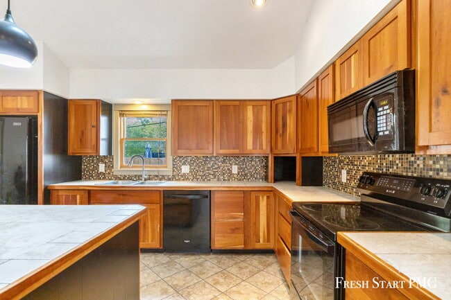 Building Photo - Spacious 4-Bedroom Home with Modern Style & Flexible Spaces