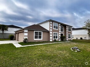 Building Photo - Ultra spacious 4/2.5 with 3 car garage and...