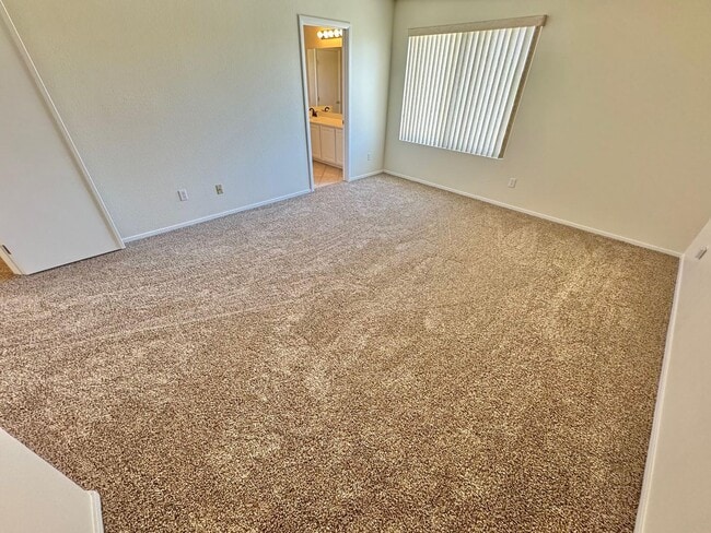 Building Photo - WELCOME TO THIS SPACIOUS 4-BEDROOM, 2.5-BA...