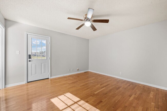 Building Photo - Charming Brick Home with Soaring Ceilings & Updated Finishes!