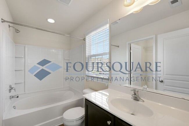 Building Photo - End Unit Townhome | Washer/ Dryer Included...