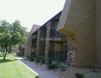 Building Photo - 2nd floor unit in upscale guard gated SW complex near Strip