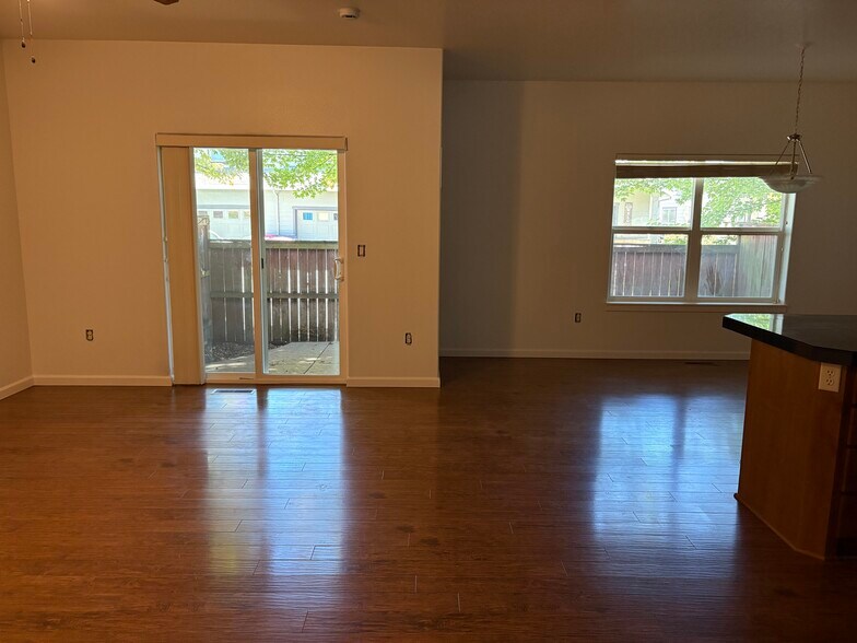 living room + dining area - 2066 NW Yohn Ranch Drive
