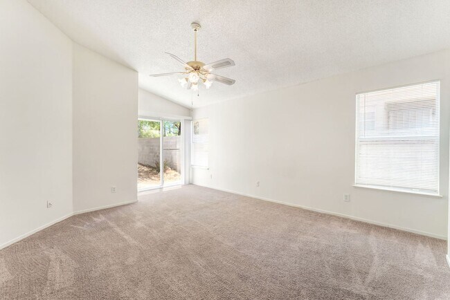 Building Photo - Vaulted Ceilings, Cozy Fireplace & Desirable Single-Story Living Near The Lakes!