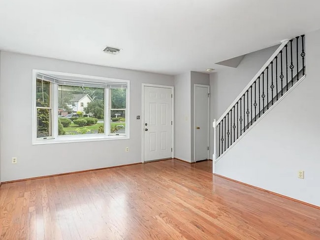 Building Photo - This charming house offers a cozy and comfortable living space.